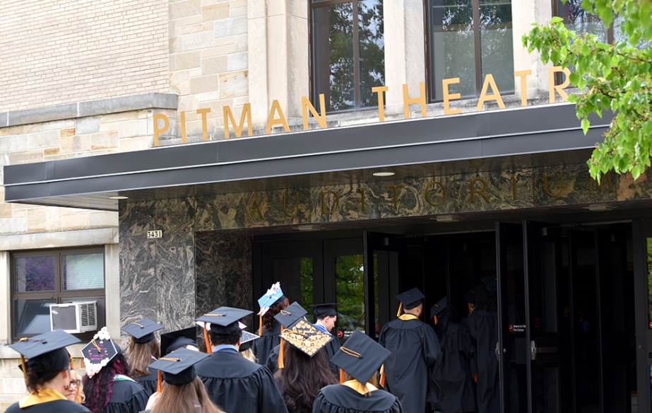 Graduates on their way into Pitman Theatre doors