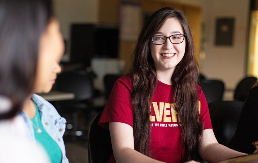 Alverno students smiling in classroom