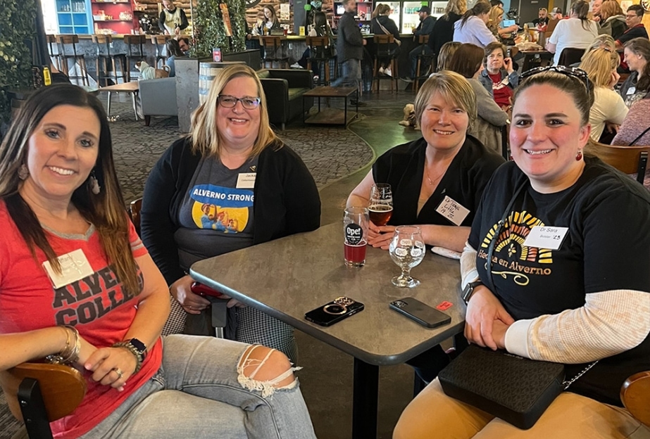 A group of four alums at Ope! Brewing Co