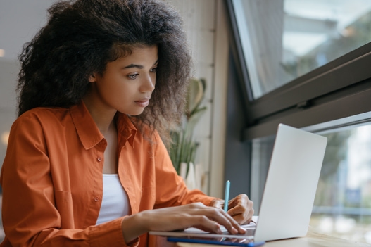 Girl_on_computer_upload.jpg