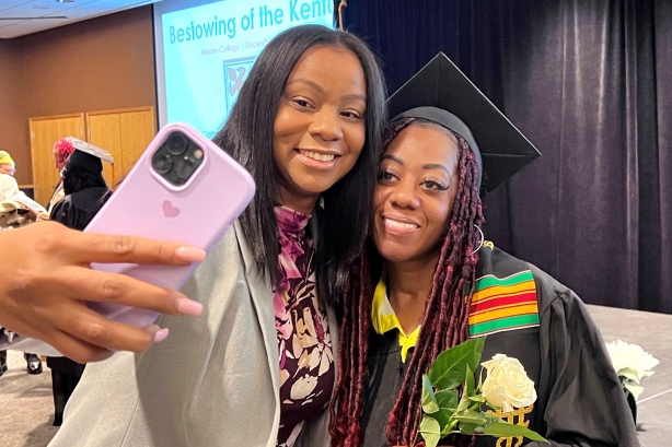 Graduate and friend taking a selfie