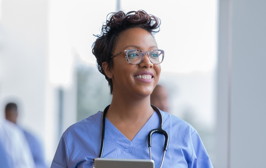 Young black nurse smiling