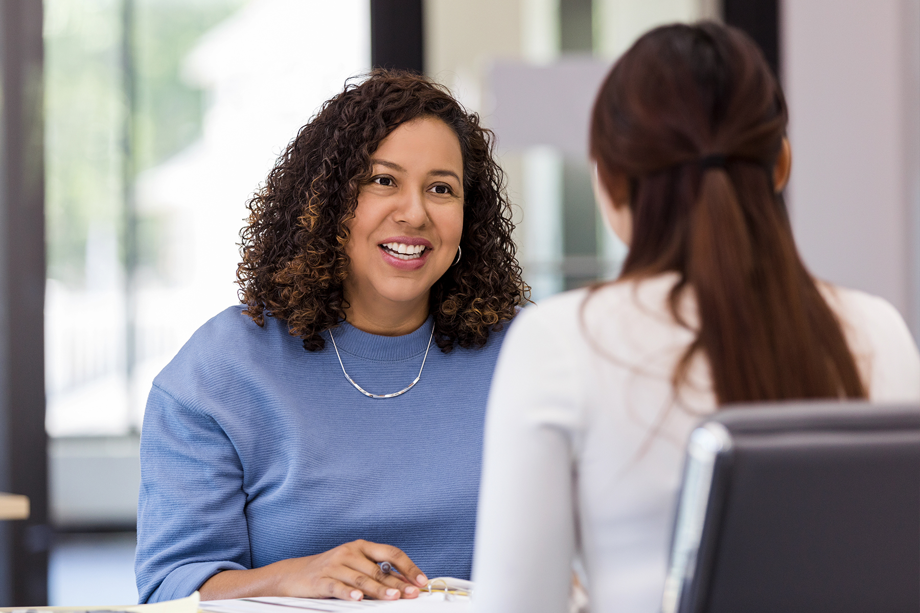 An employer interviews a potential intern